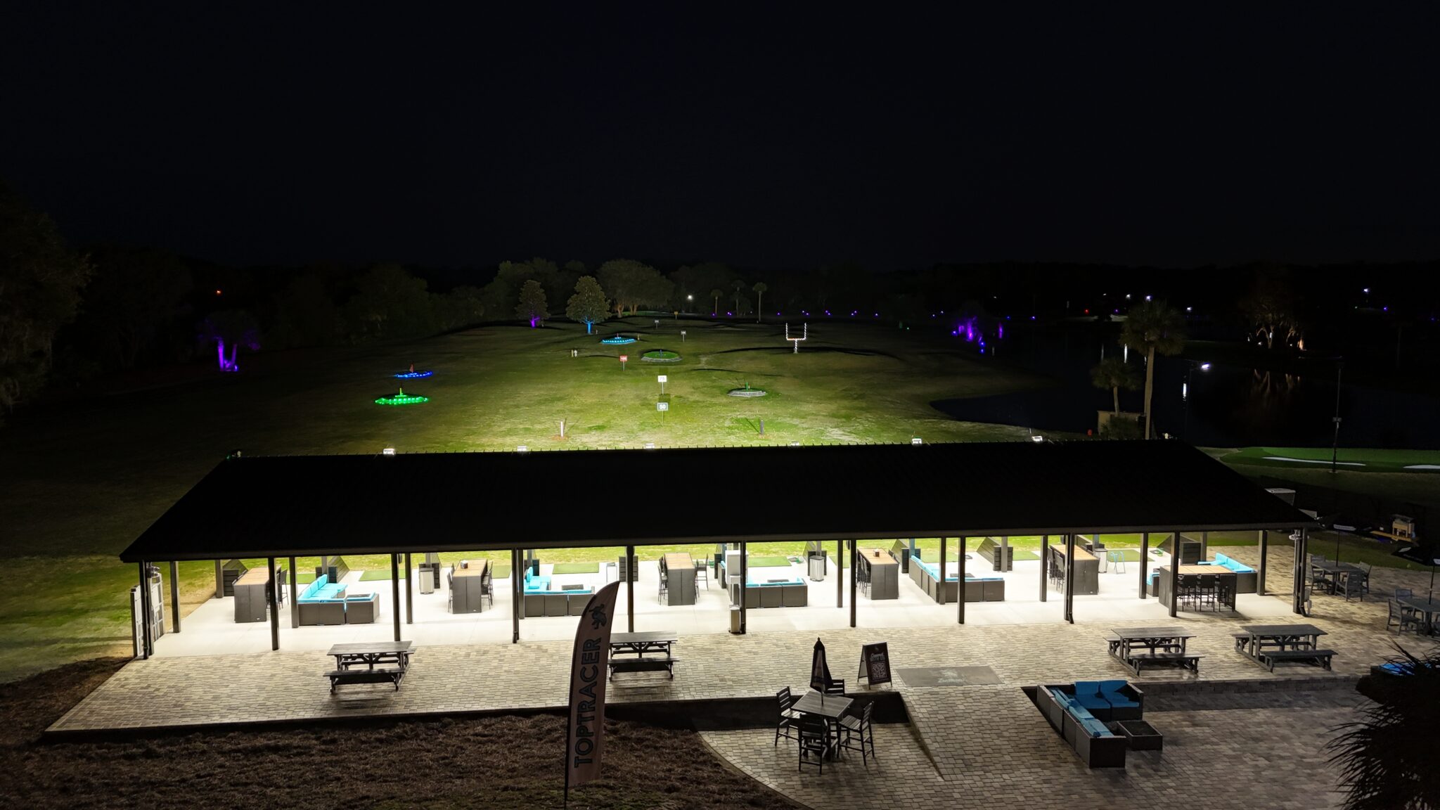 ZenWoods Toptracer bays and illuminated range targets at night